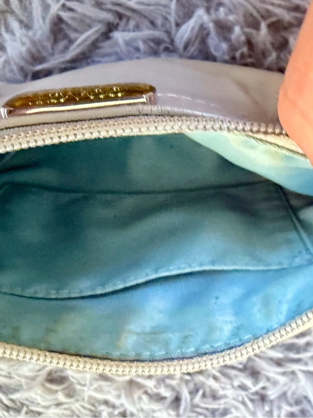 Coach ivory leather wristlet clutch with gold logo baby blue inside